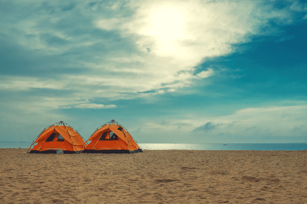 two instant tents set up on the beach