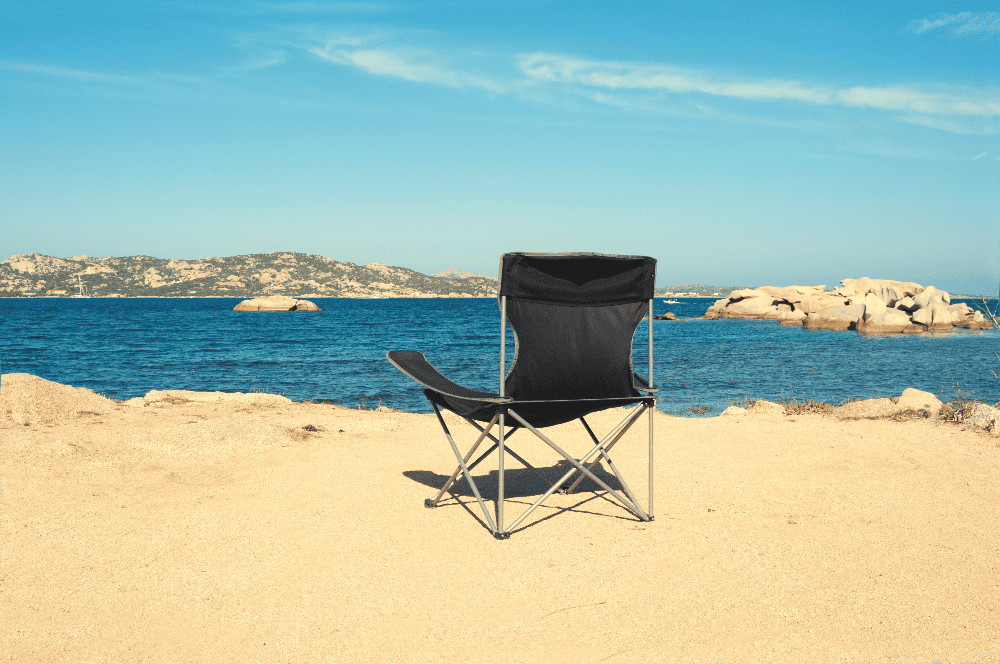 camping chair sitting on the beach