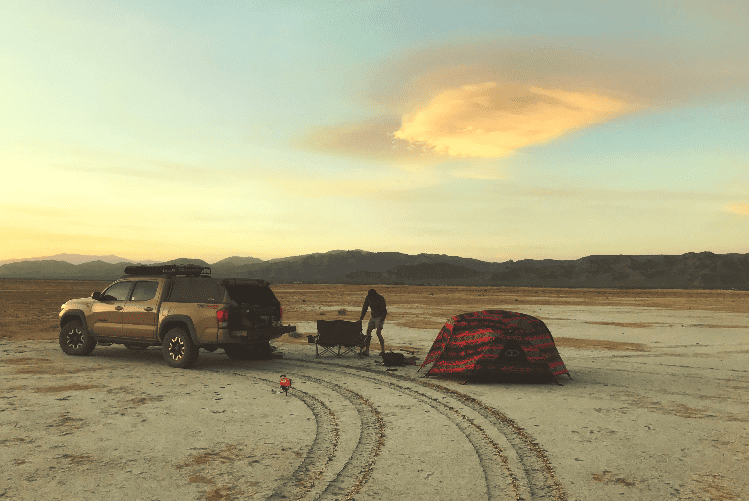 truck and tent in desert
