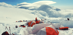 multiple tents in the snow