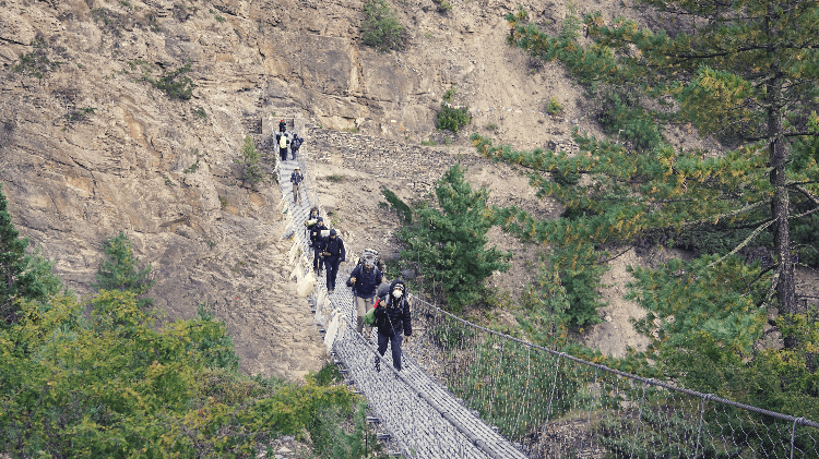 swinging bridge in nepal