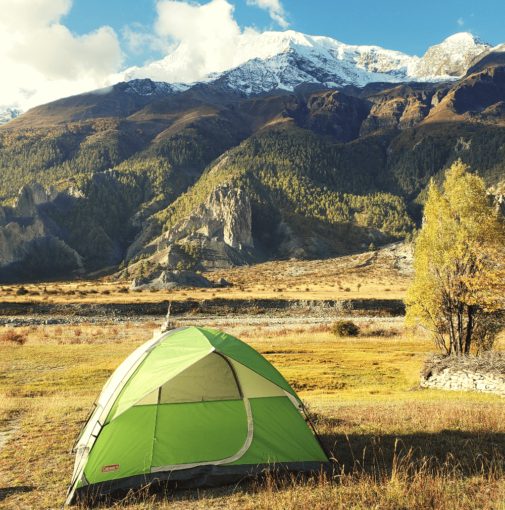 campsite at the base of a mountain in nepal