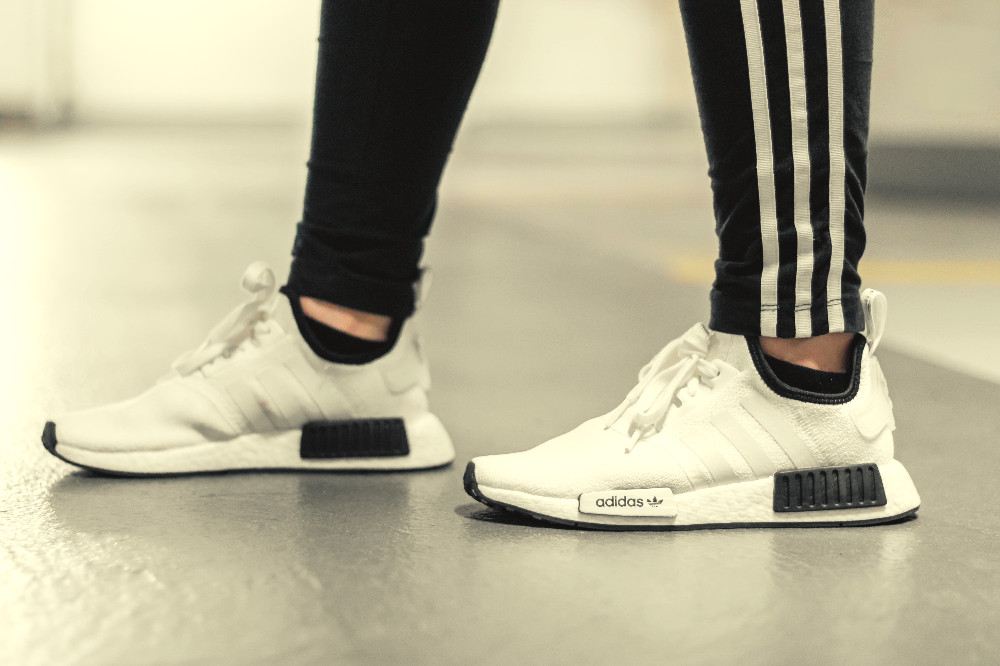 woman in tennis shoes and leggings