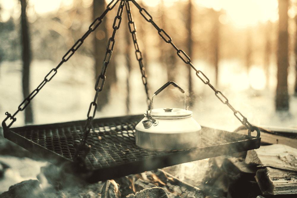 kettle above a campfire