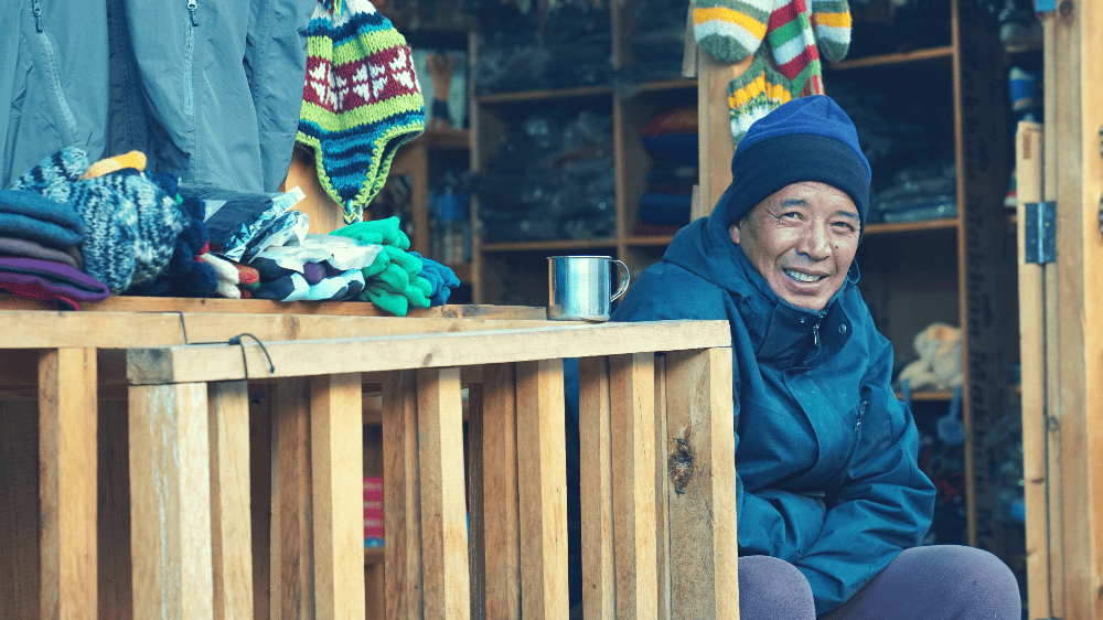 nepali man sitting