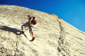 man rock climbing yosemite valley