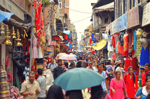 crowd of people walking through kathmandu
