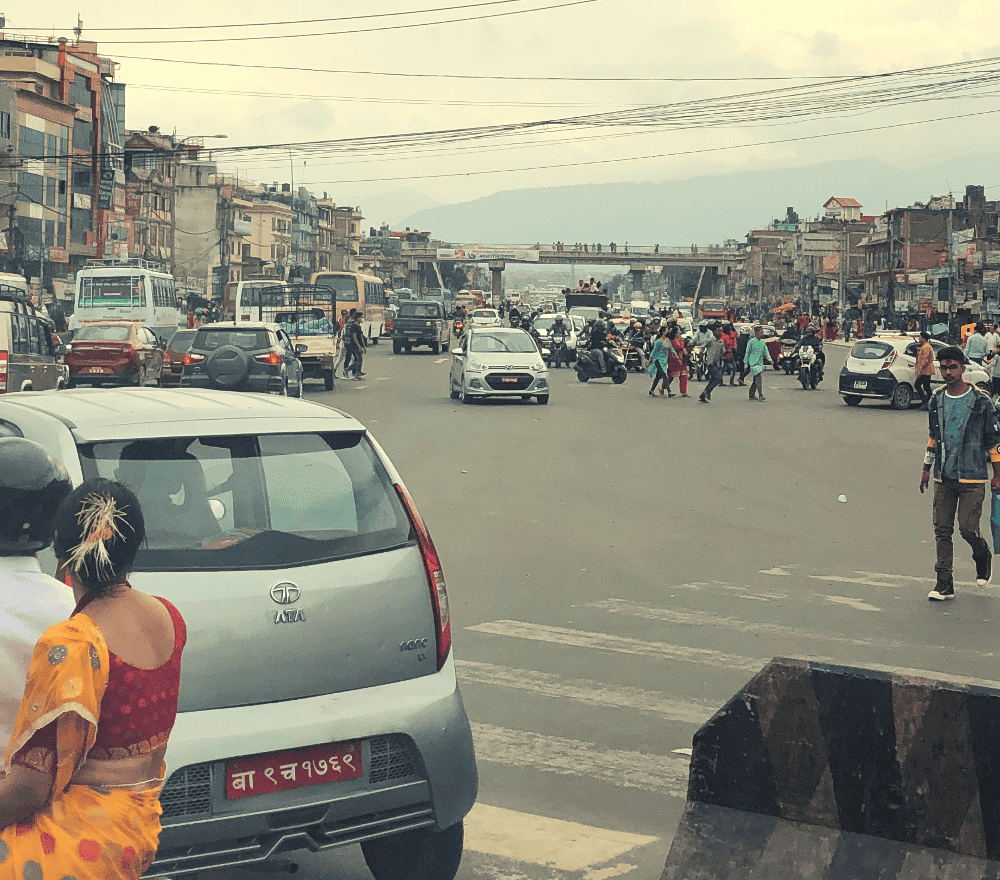 people walking through the streets of kathmandu