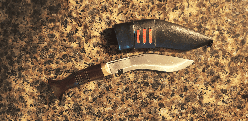 knife and sheath resting on counter