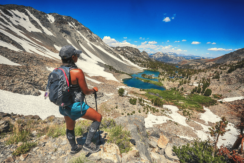 woman hiking on a trail in california