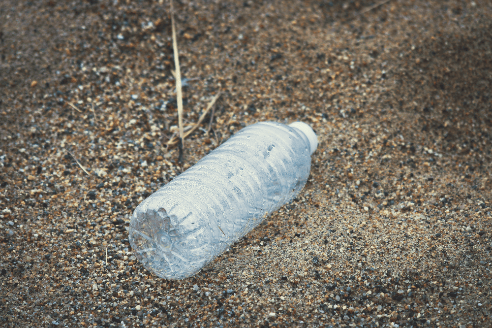 plastic water bottle lying on the ground