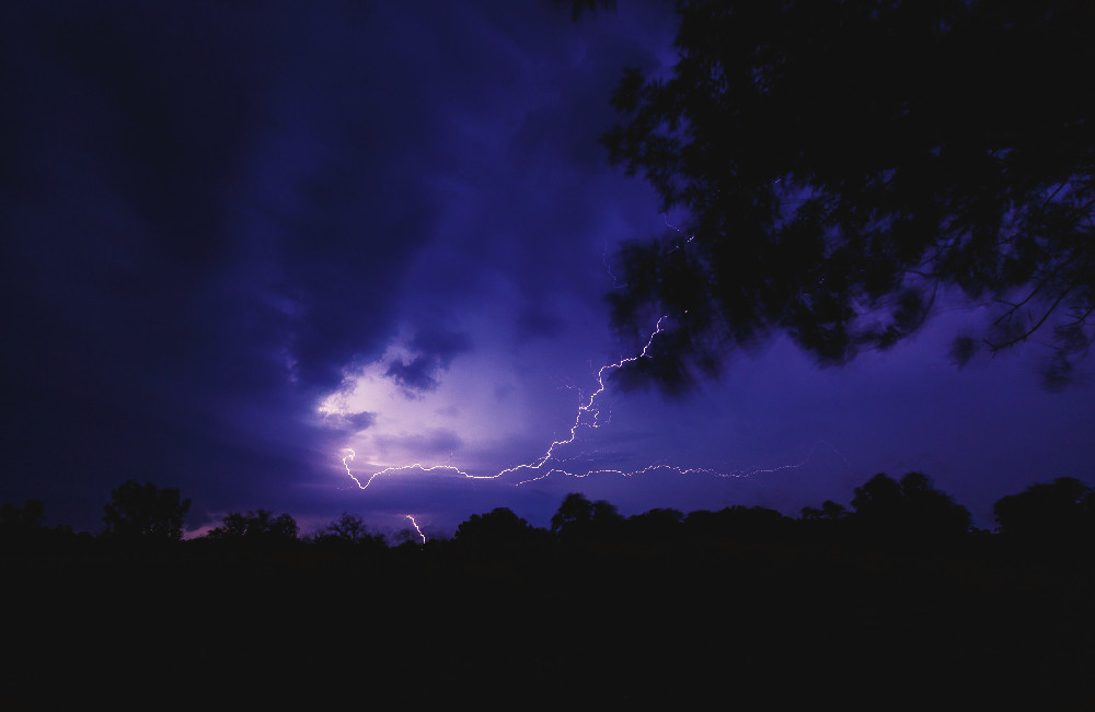 lightning flashing in the night sky