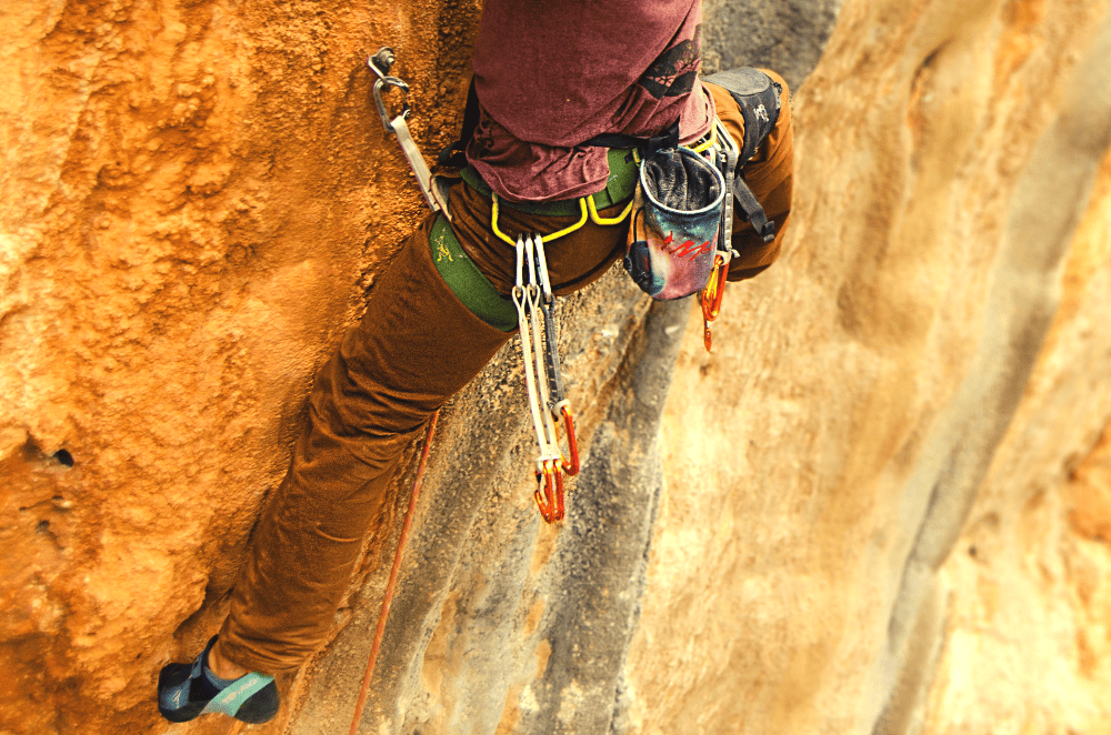 quickdraws hanging off a harness