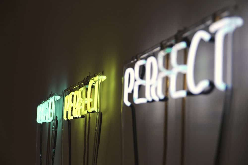 three neons signs in new york city perfect