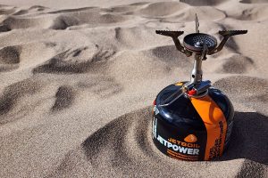 jetboil single propane burner on sand