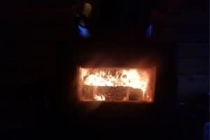 wood stove fire in the dark