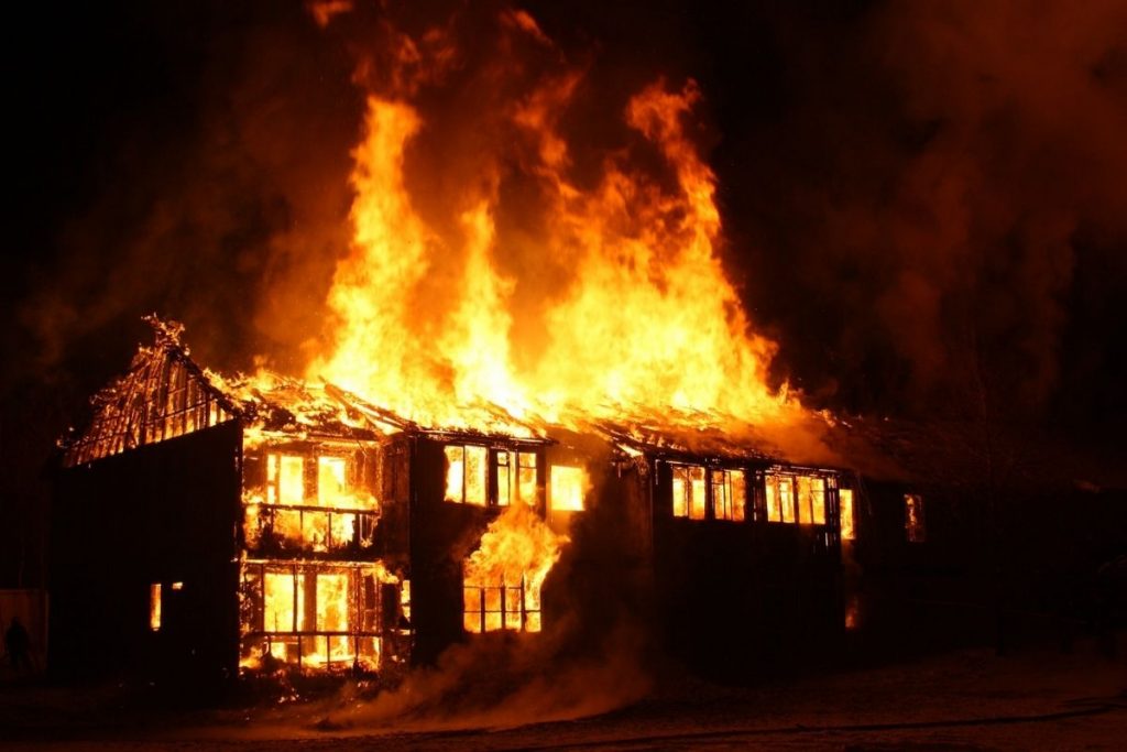 house on fire at night