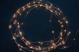 string lights making a circle against a dark sky