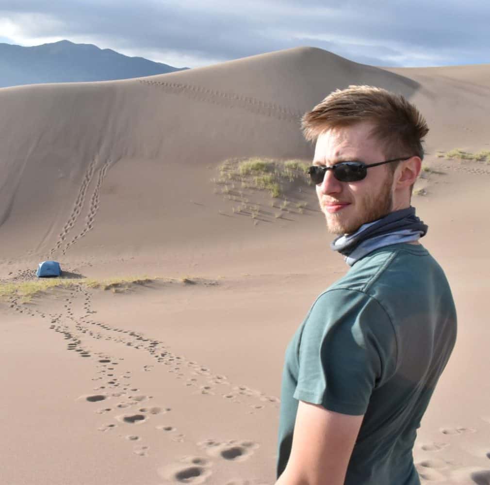 man standing in the desert