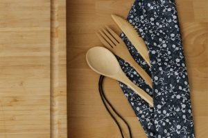 wooden utensils lying on cloth