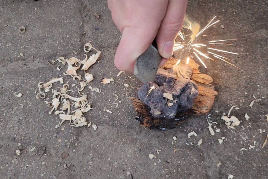 making sparks with a ferro rod