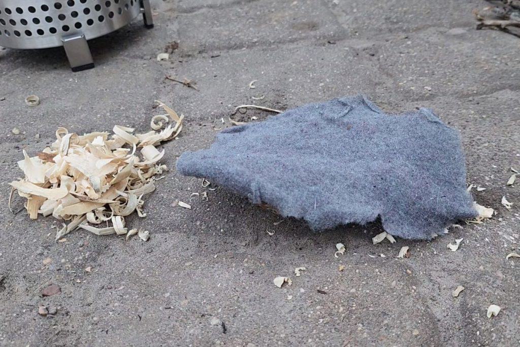 sheet of lint on a piece of bark