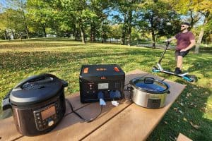 power station, crock pot, instant pot on a picnic table man with scooter