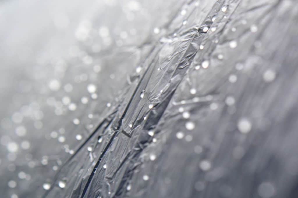 gray tarp with water droplets