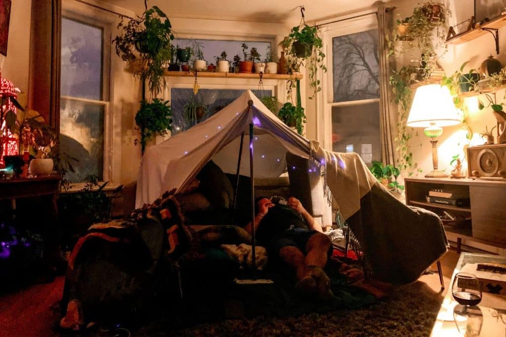 tent set up inside a living room