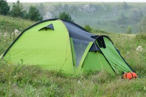 green tent on grass
