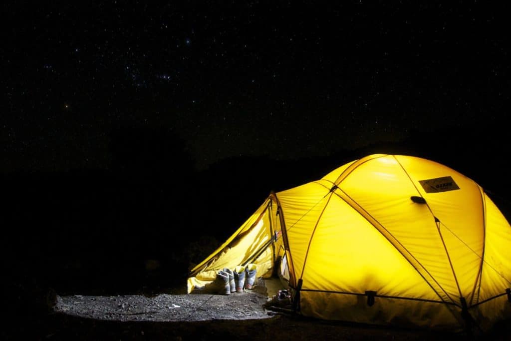 yellow tent illuminated at night