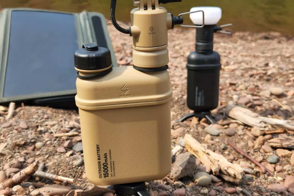 portable batteries with lights on a river bank