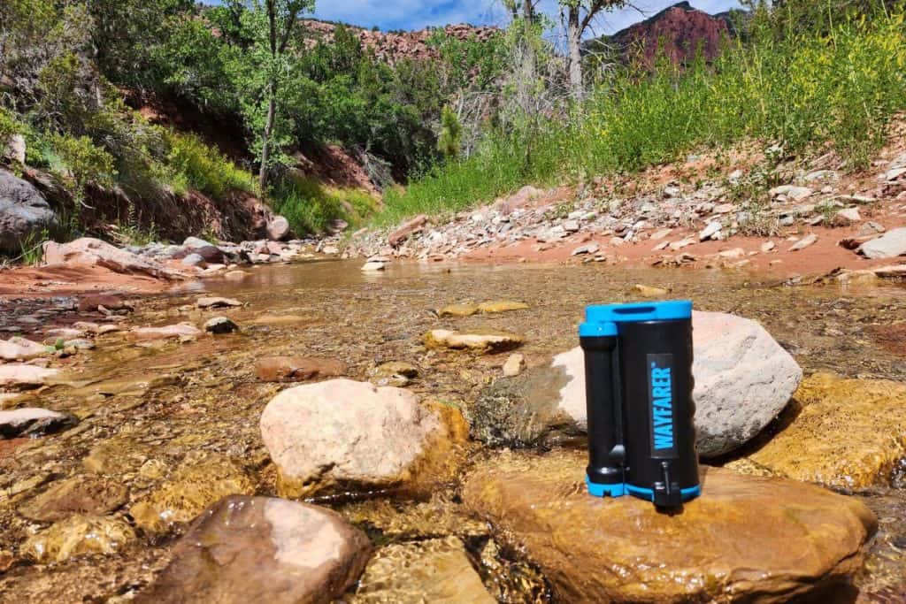 lifesaver wayfarer on a rock in a river