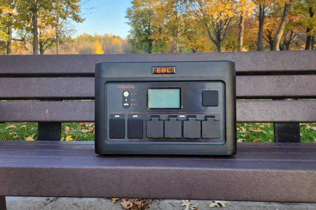 ebl power station sitting on a bench during autumn