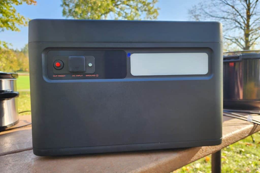 back of a portable power station on a picnic table