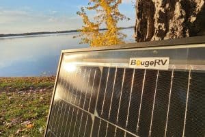 bougerv solar panel at sunset by a lake